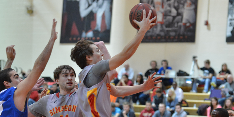 Men's basketball done in by Central in OT