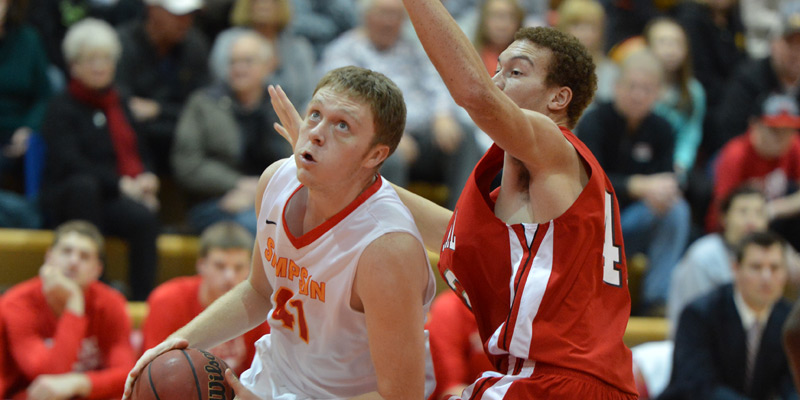 Amsbaugh's 21, clutch defensive plays push Storm men past Central