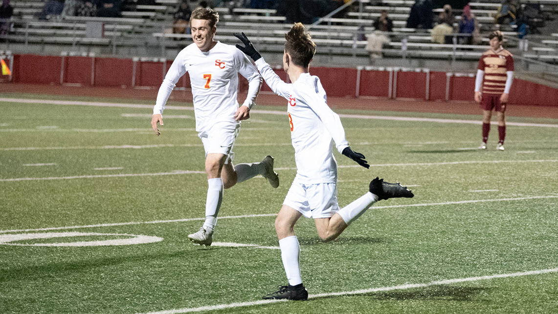 Senior Justin Gilmour (7) and freshman Matt Hasken (23). Photo by Corinne Thomas
