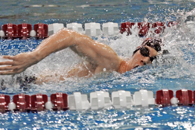 Swim teams split at Coe