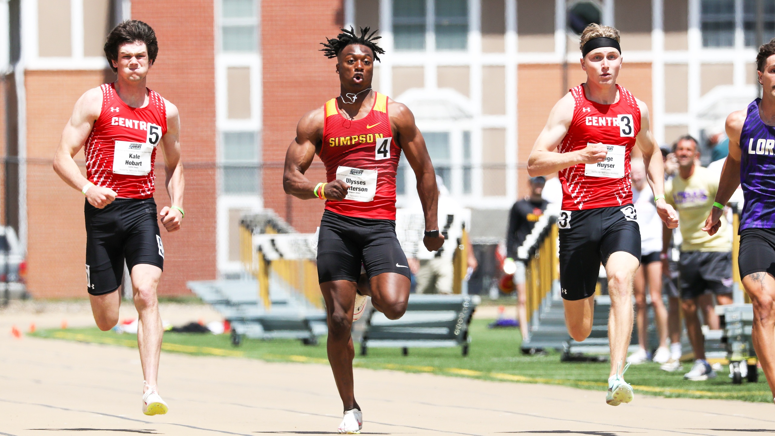 Senior Ulysses Patterson (center). Photo courtesy of Nebraska Wesleyan Athletics.