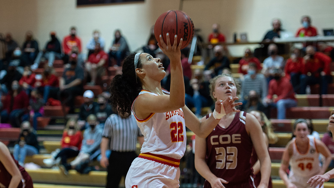 Cassie Nash drives to the hoop against Coe in the American Rivers Conference Championship game March 13, 2021.