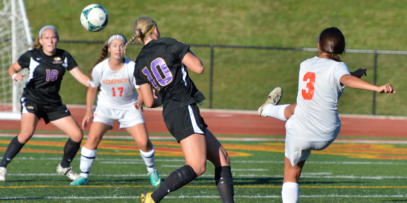Freshman Rachel Muse fires a shot past defenders from UW-Stevens Point in Simpson's 3-2 loss on Saturday, Sept. 21. Muse scored both of Simpson's goals.