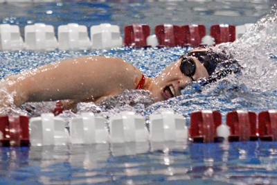 Swim teams split at Coe