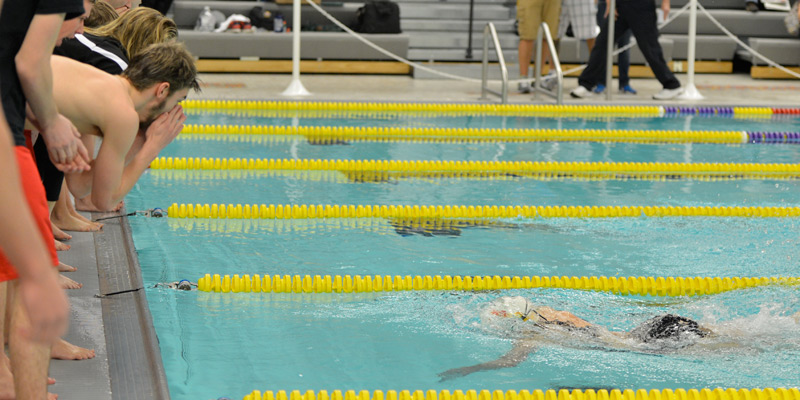Swimming and diving teams fall at Coe in season opener