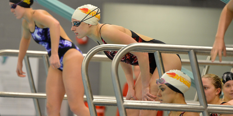 Swimming and diving teams get first wins of 2014-15